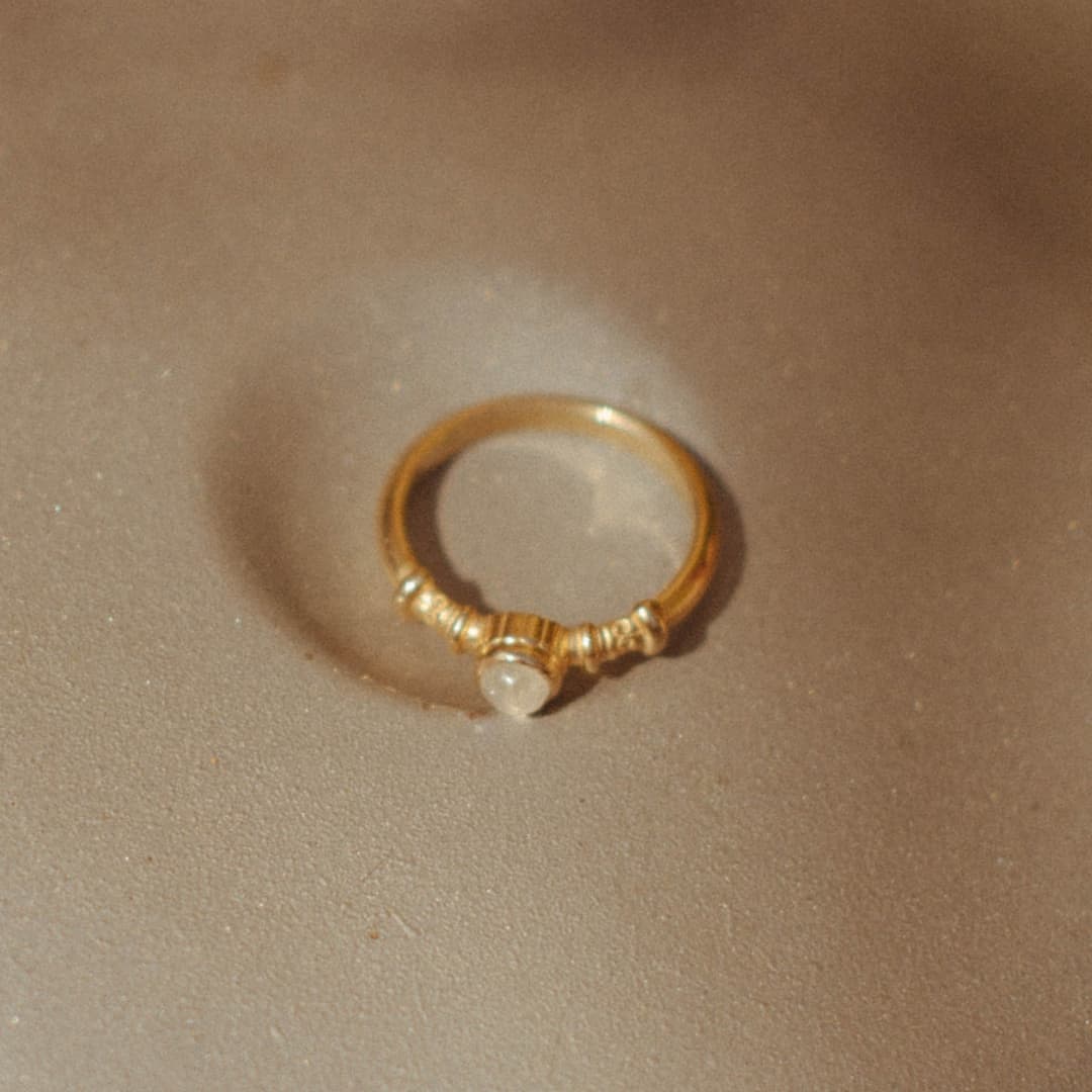 Qu